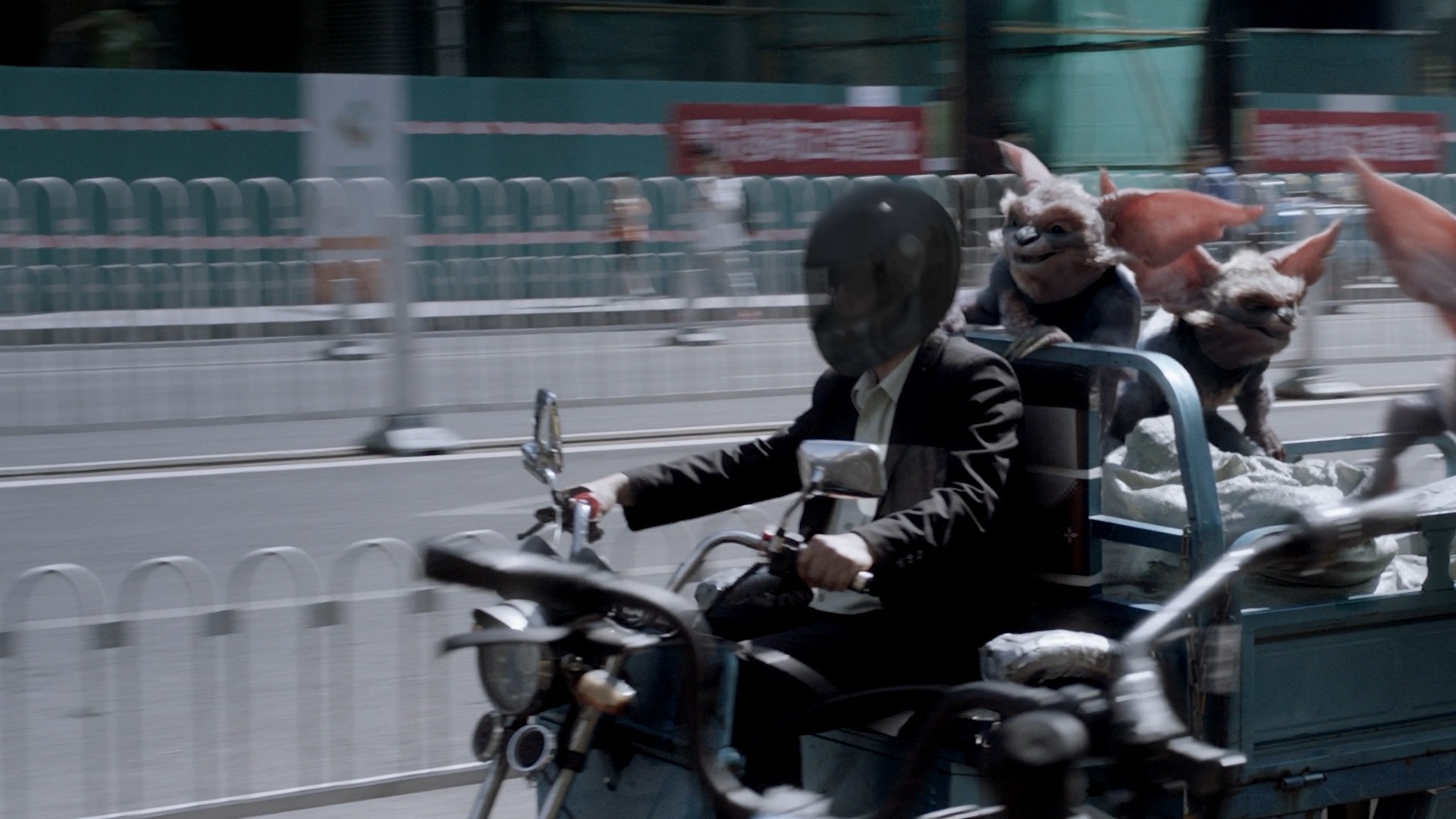 The driver with a helmet added.